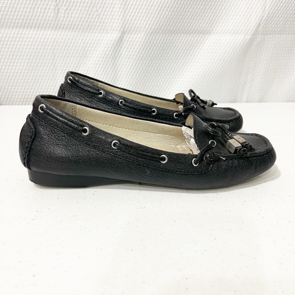 Michael Kors Amber Black pebbled tassel flats. - Picture 10 of 13
